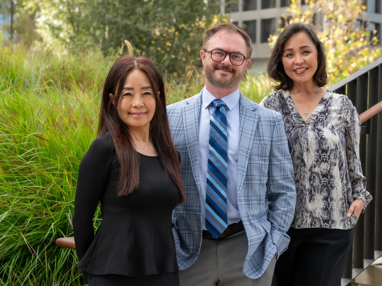 Group photo of three staff at Irell's Century City office